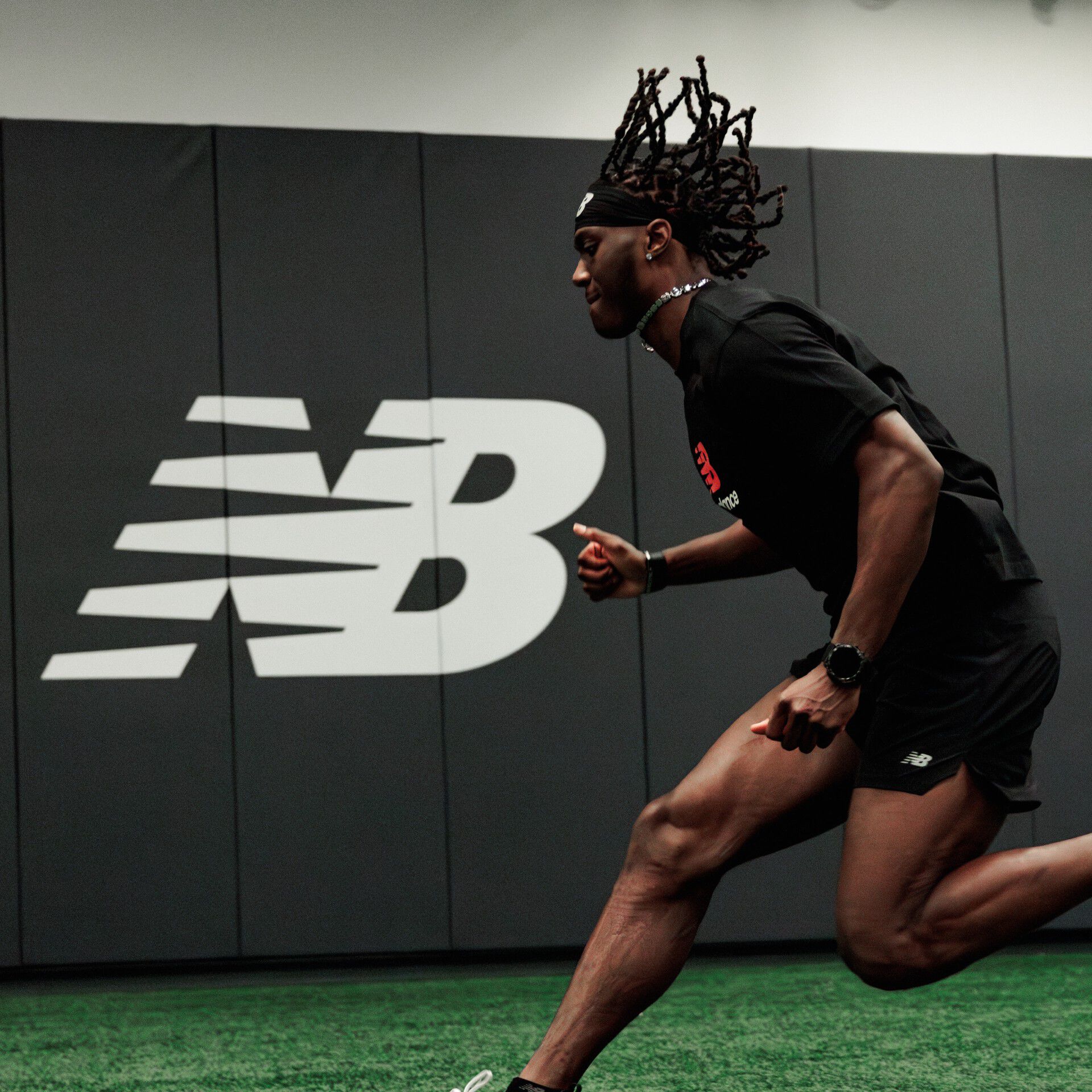 Marvin Harrison Jr running on turf.