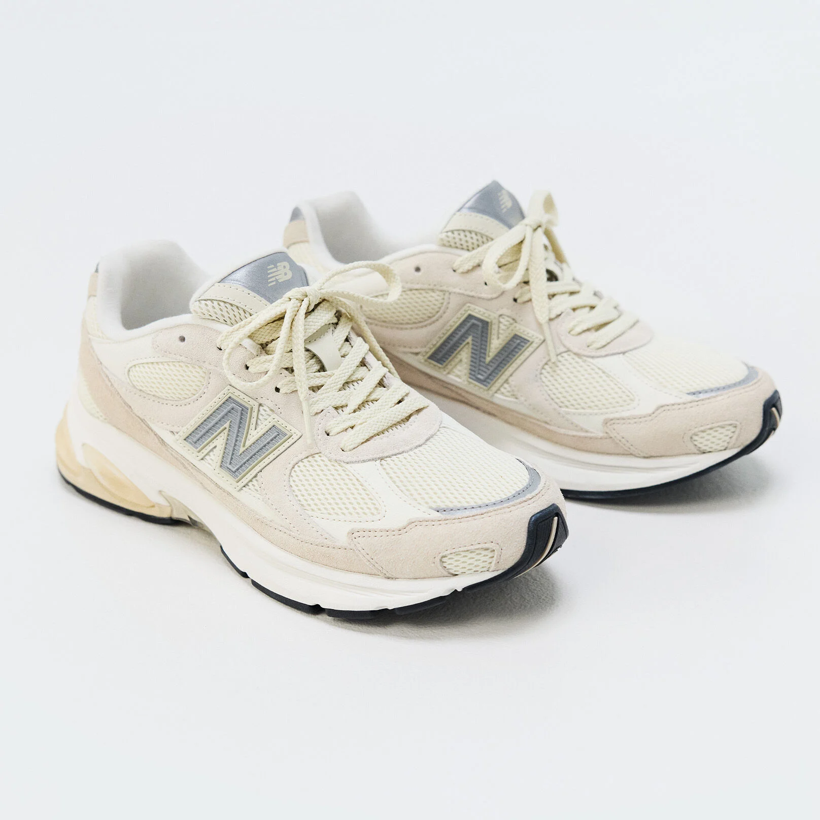 A pair of New Balance sneakers on a white background 