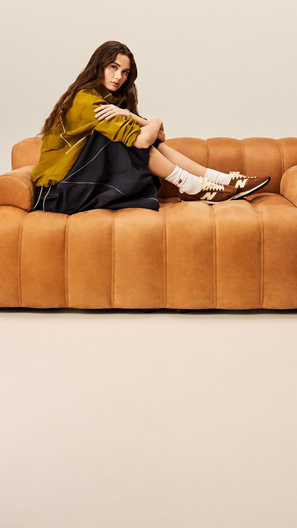 Girl wearing the 471 while sitting on a couch