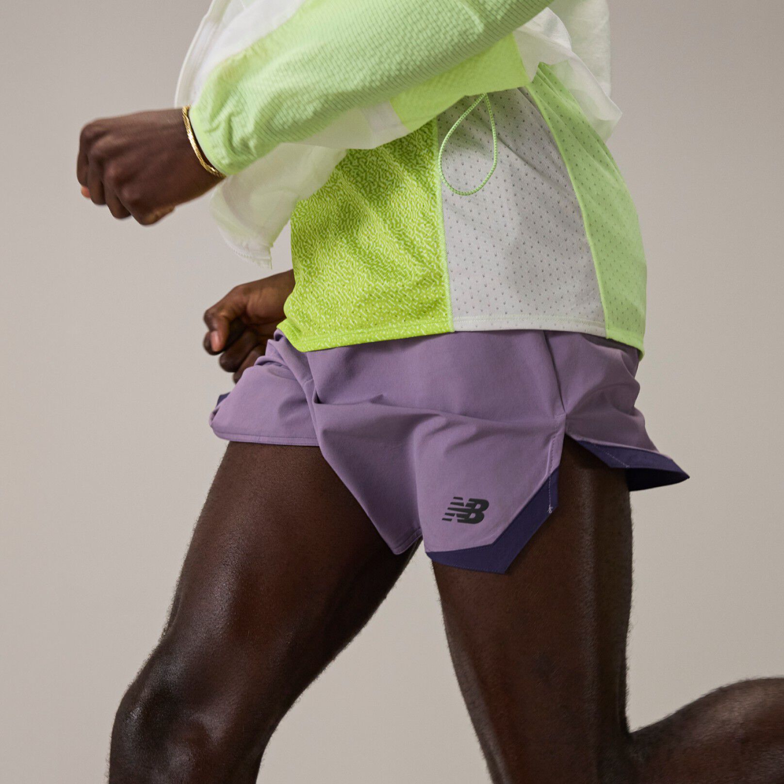 Tinoda Matsatsa wearing RC apparel running in studio. 