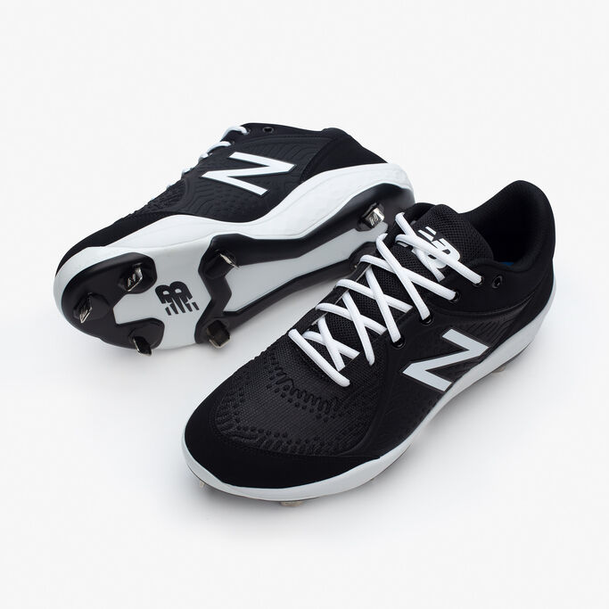 triple white new balance cleats