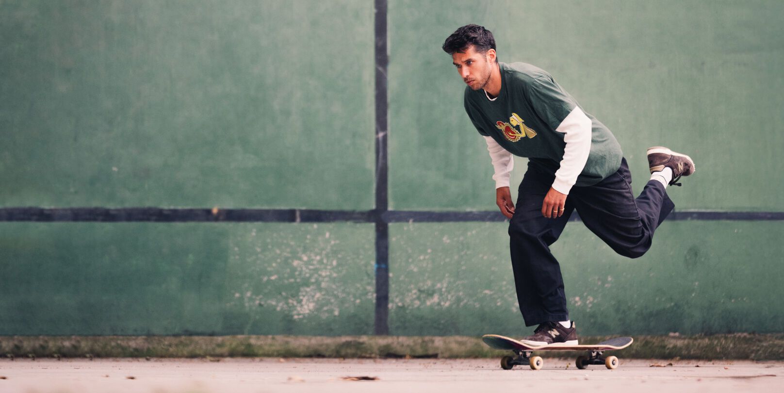 Tom Knox skating while wearing Krooked x Numeric 600 shoes.