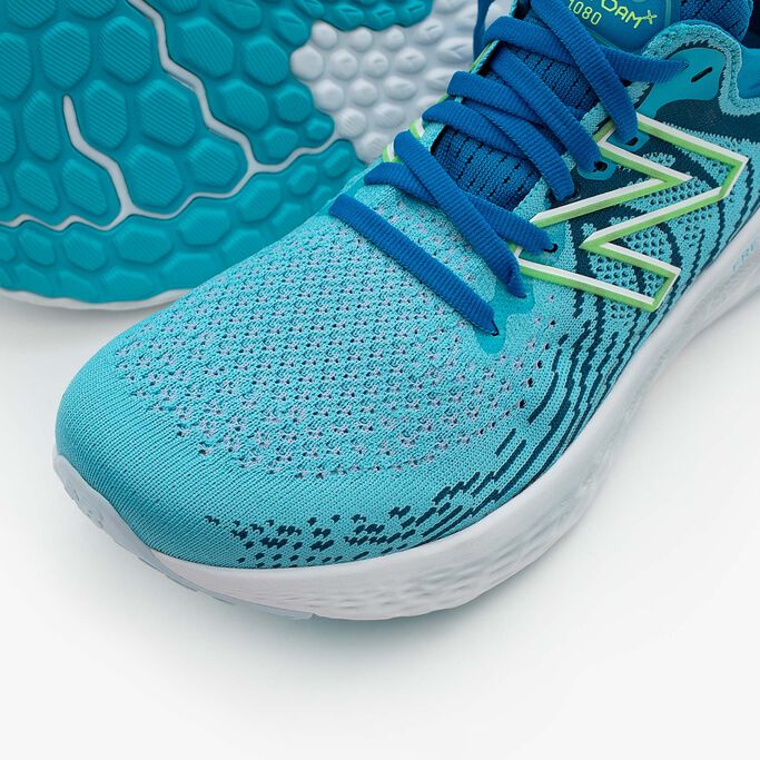 Top of teal Fresh Foam 1080v11 running shoe