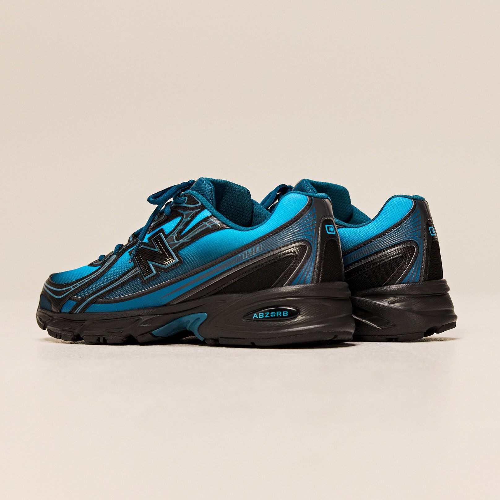  Side profile of a pair of shoes shot at an angle 