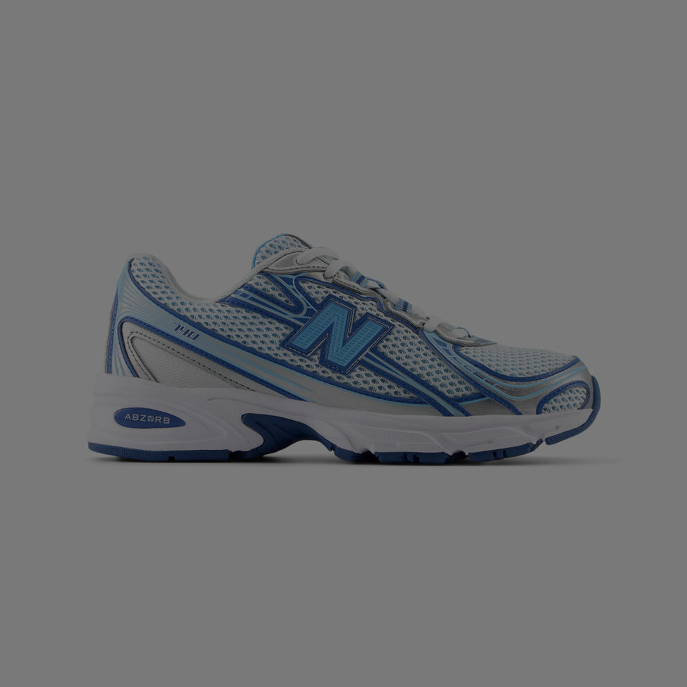 Picture of blue and white New Balance 740.