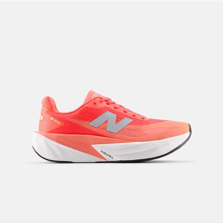 Orangey red running shoes with a white outsole.
