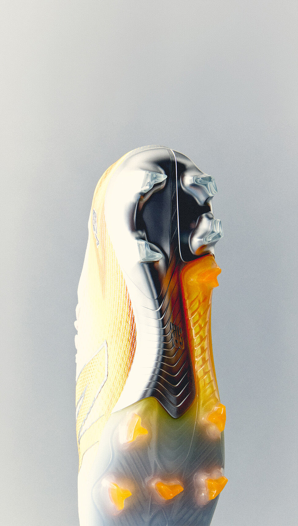 Bottom view of a white and yellow New Balance soccer cleat highlighting the molded stud configuration against a clean light background.
