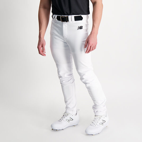 Ball player wearing white pants with white cleats. 
