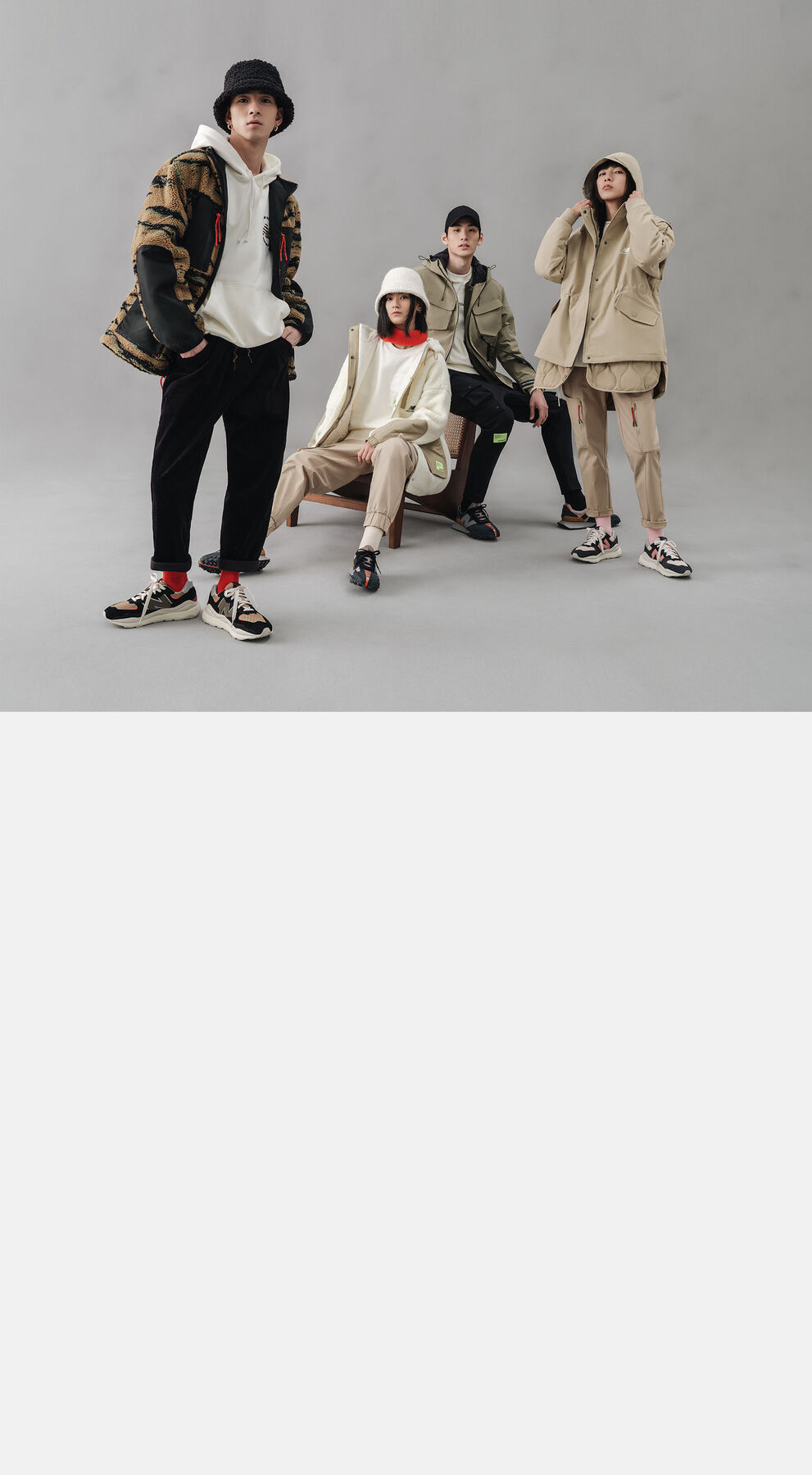 Group of four models all wearing a piece of the Lunar New Year Collection.