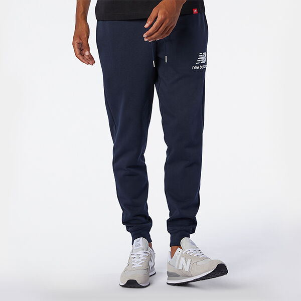 Young man wearing dark blue sweats. 