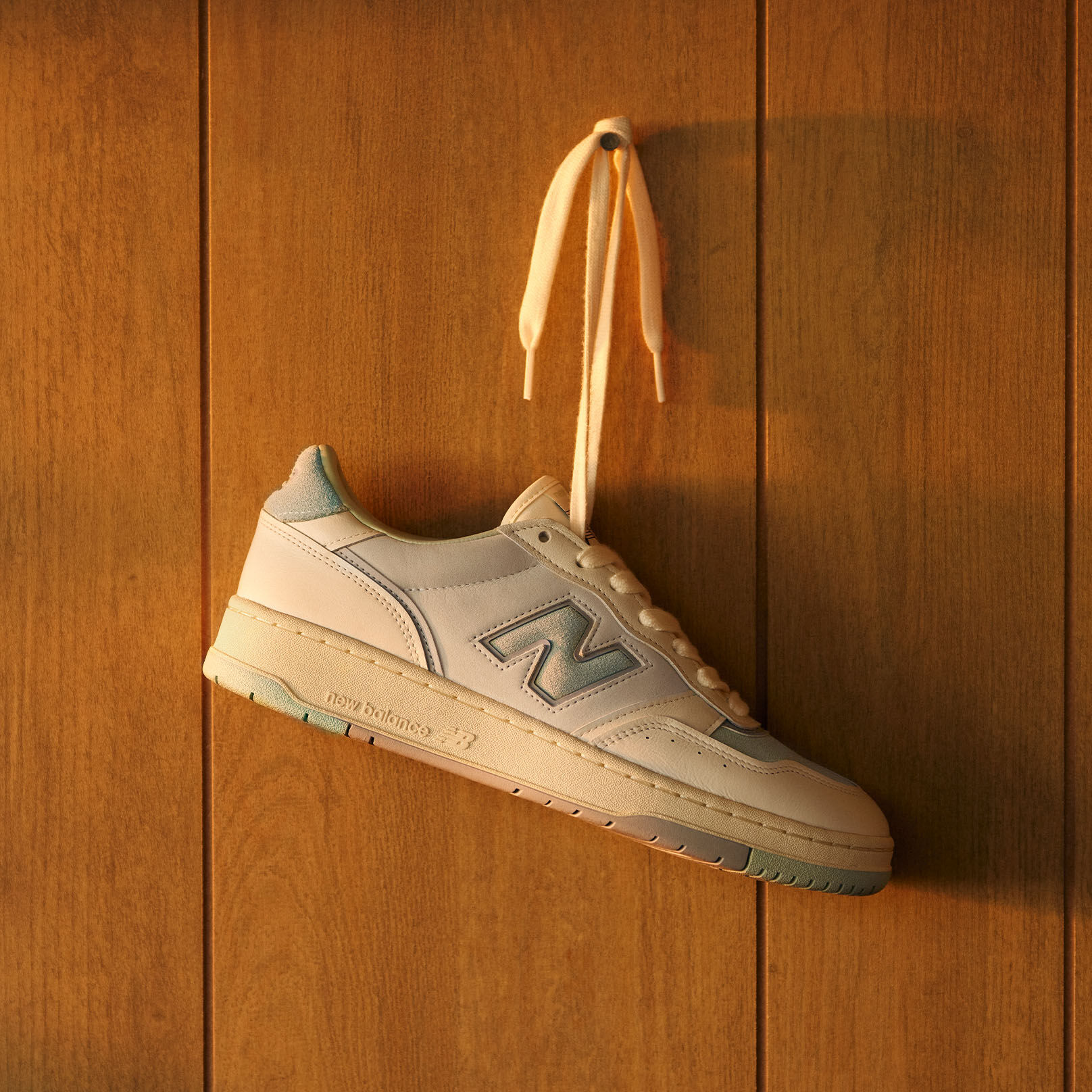 A 950 hanging by its laces