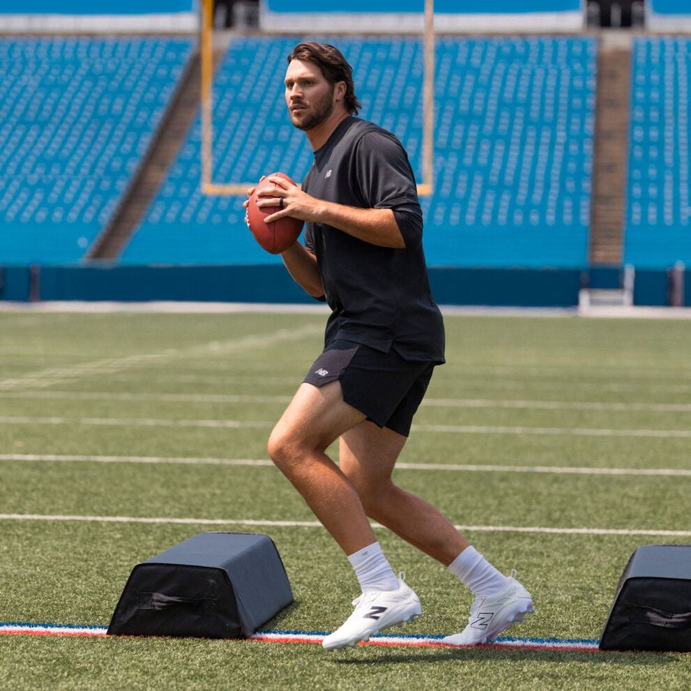 Josh Allen holding a football.