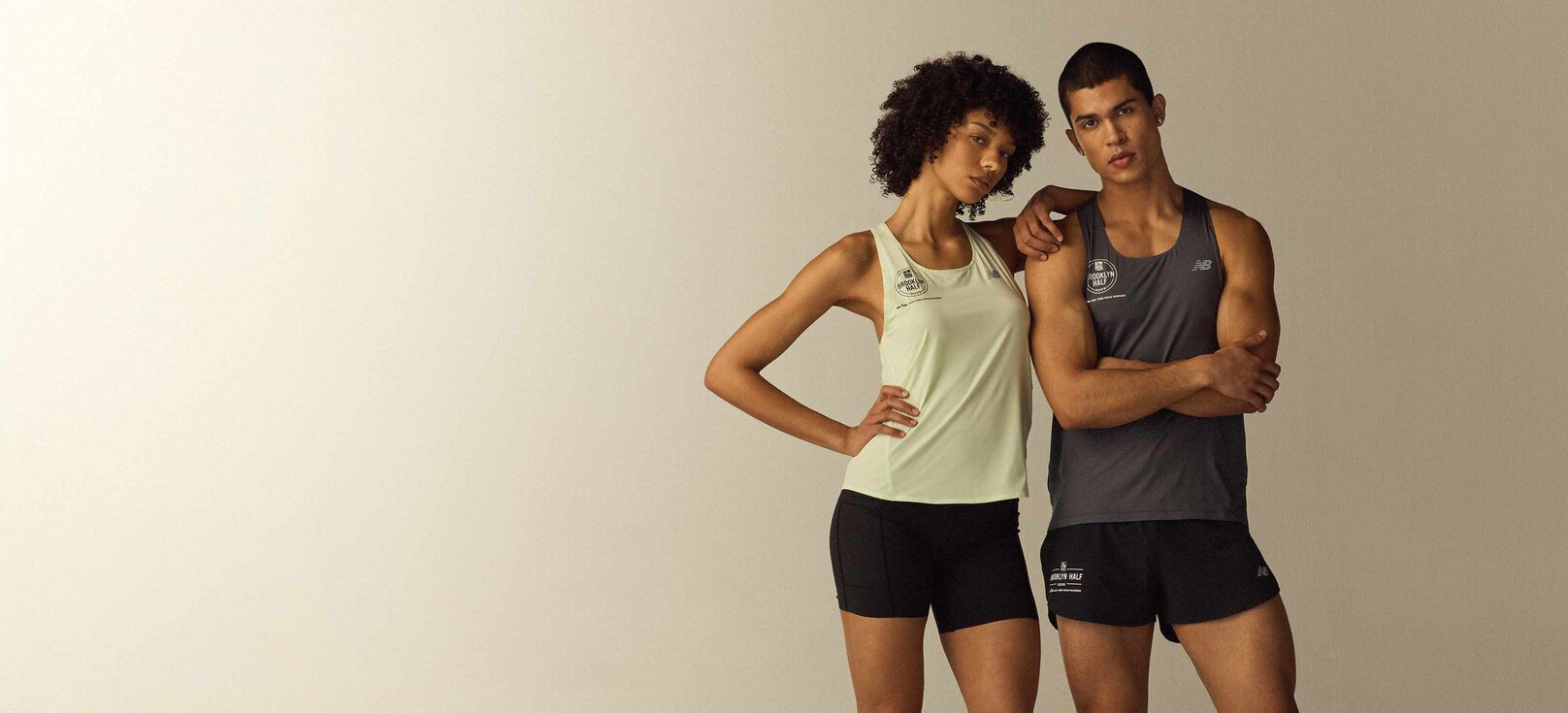 Two people wearing RBC Brooklyn Half apparel. 