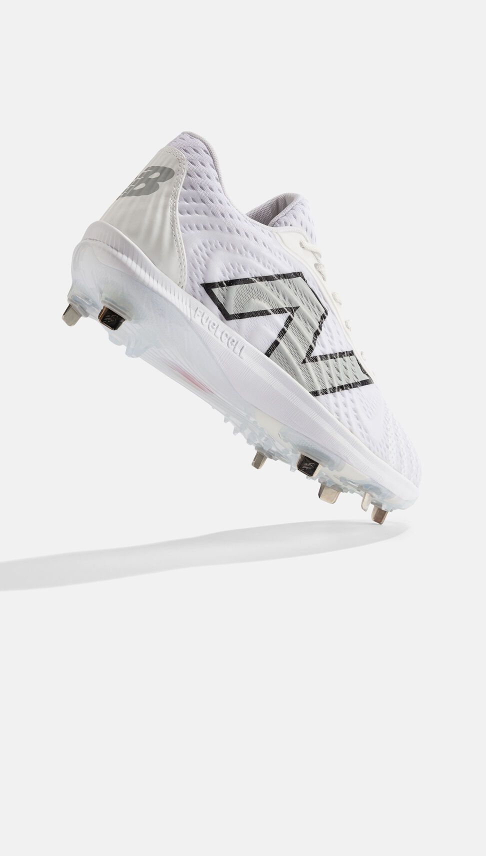 Floating white cleat showing the spike plate. 