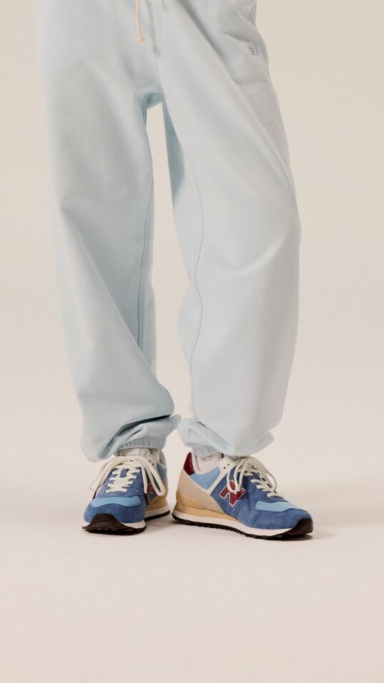 Person wearing 574 shoes.