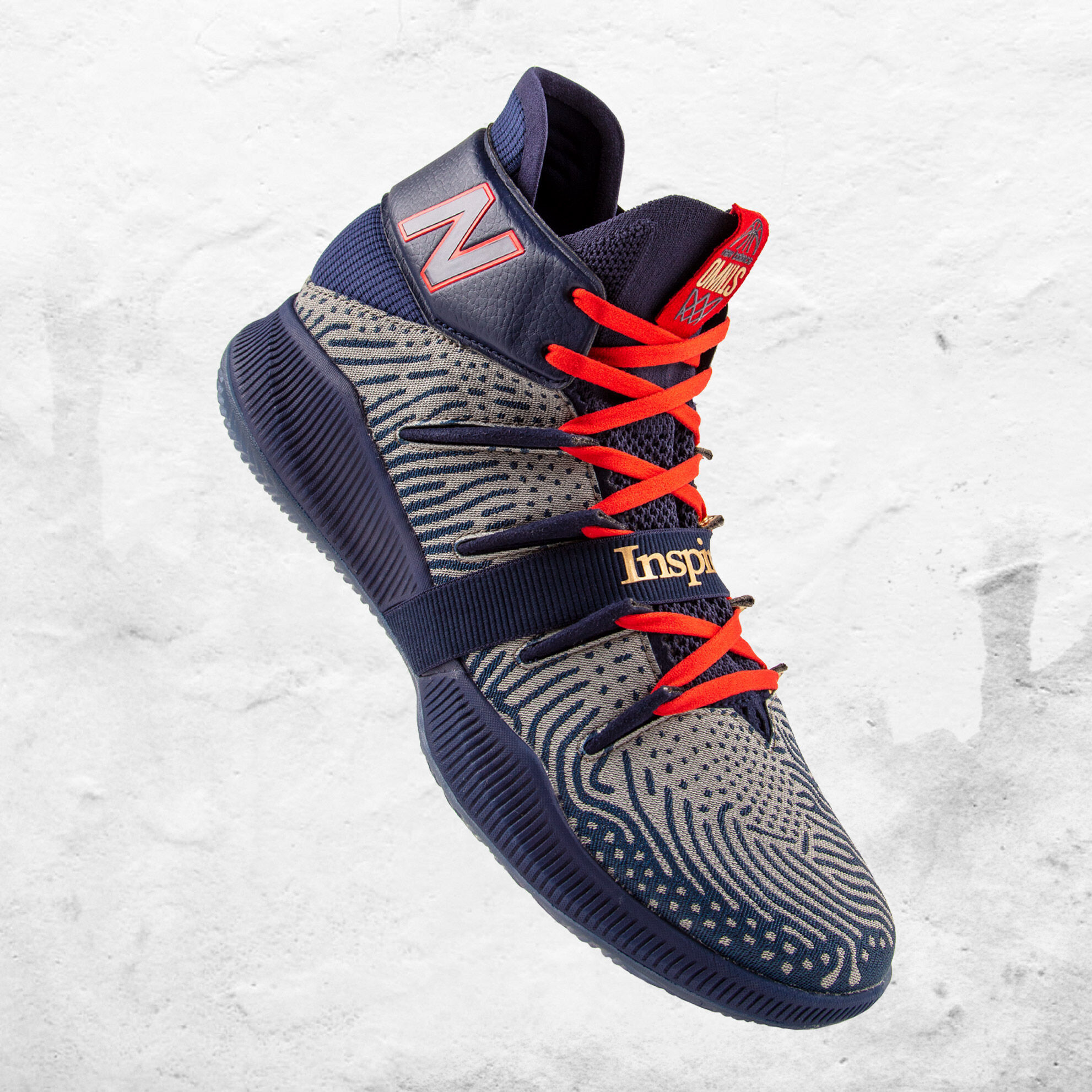 Floating OMN1S Inspire the Dream basketball shoe on textured background