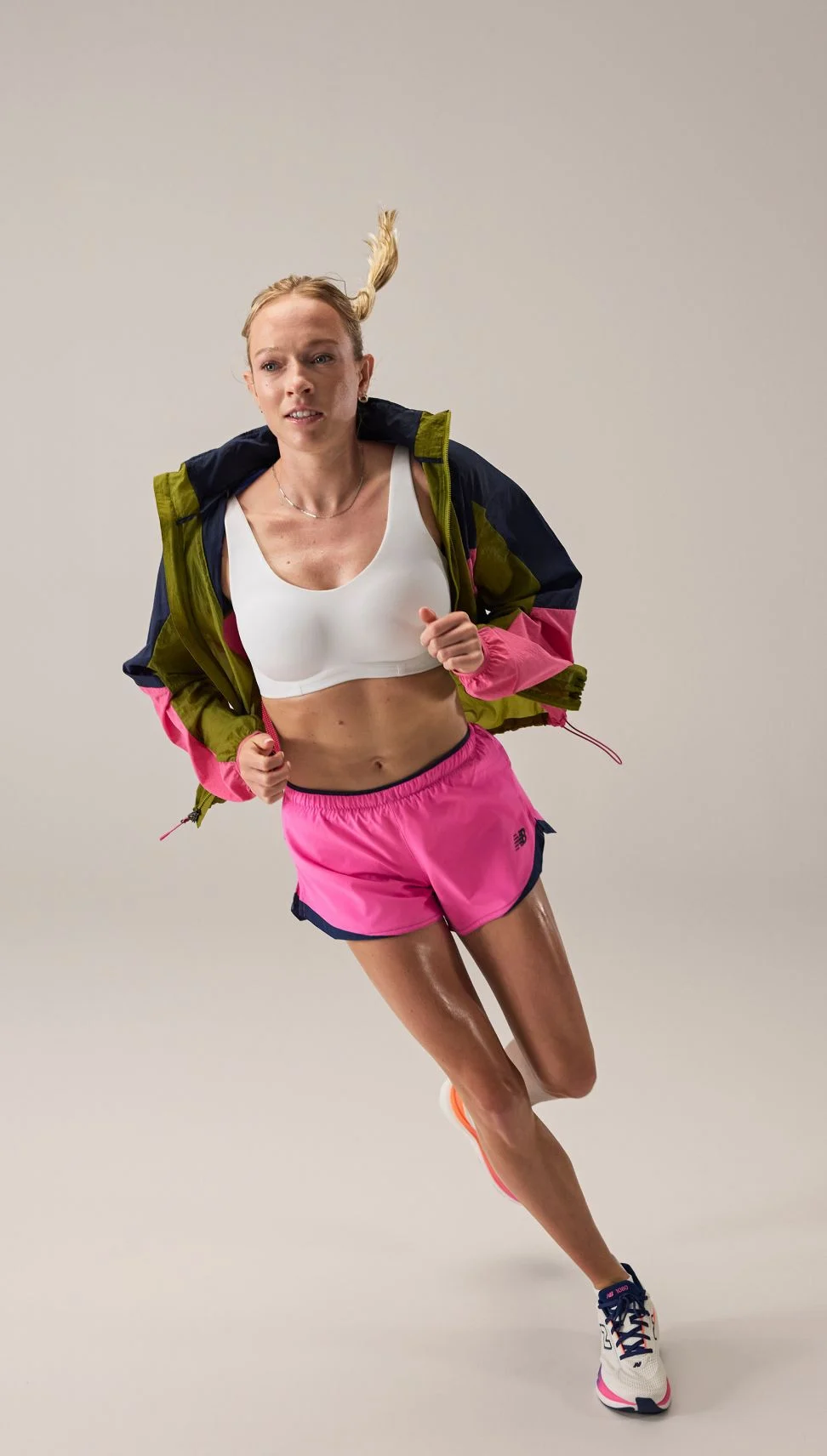 Margot Appleton running and wearing RC apparel. 