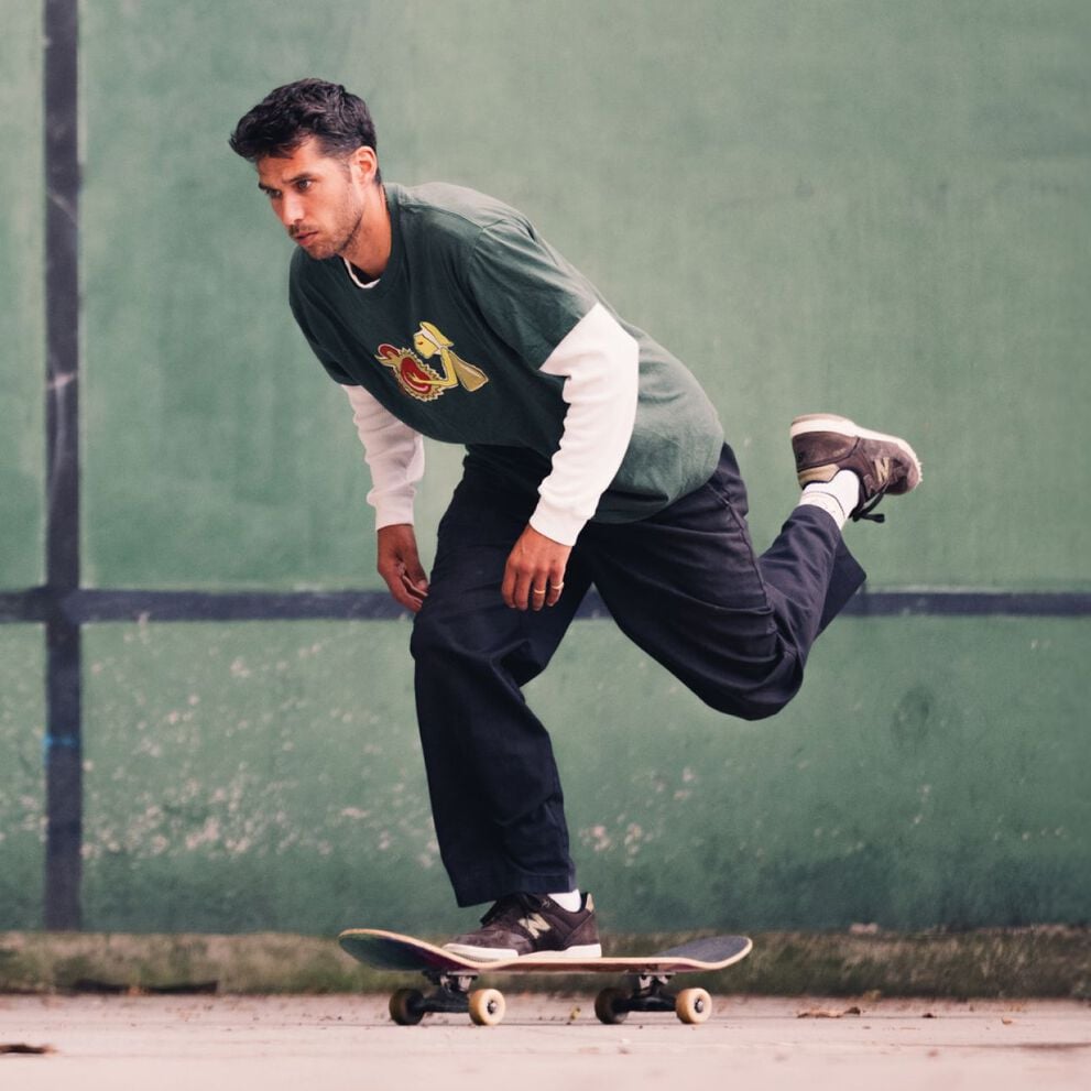 Tom Knox skating while wearing Krooked x Numeric 600 shoes.