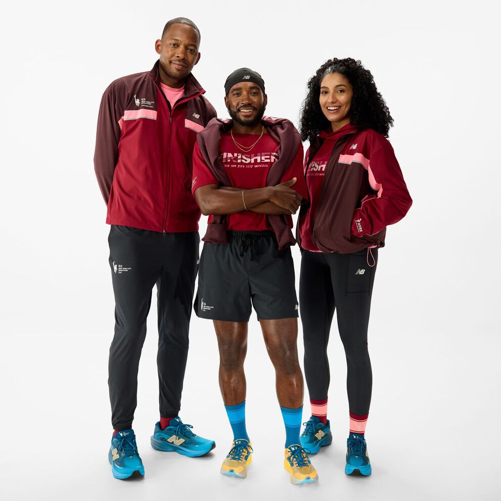 People wearing 2026 TCS New York City Marathon Finisher Collection apparel. 