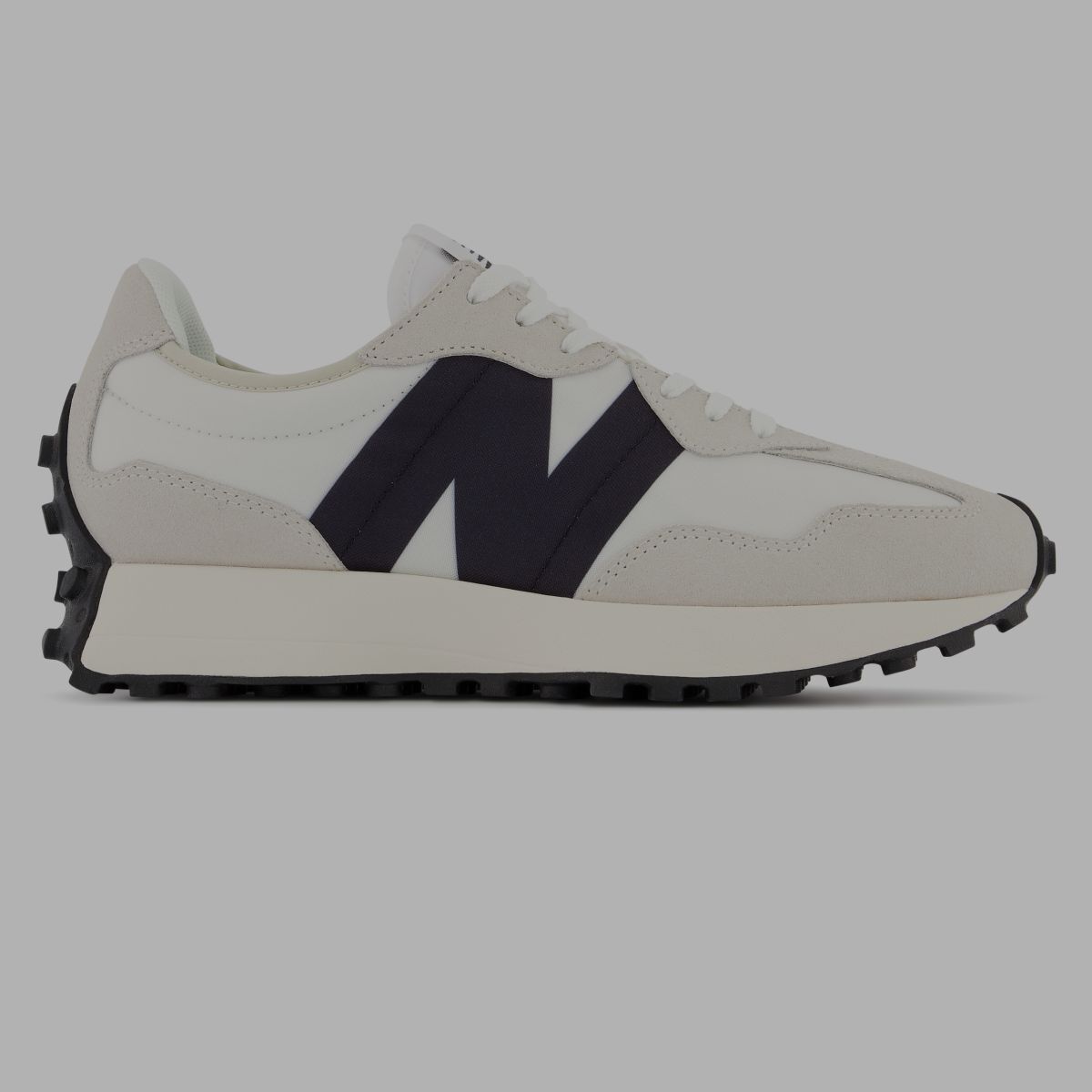 A white 327 shoe with black accents.