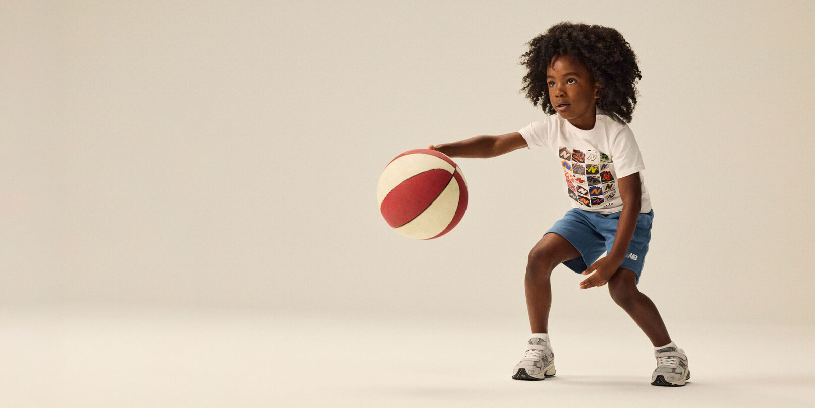 Boy wearing a pair of 2010 sneakers. 