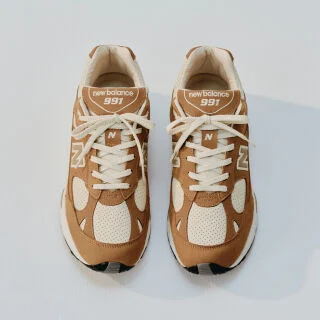 Close up view of a New Balance Made in UK sneaker tongue and laces.