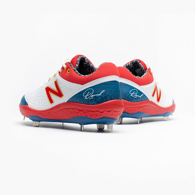 Both metal cleats showing the David signature on the back.