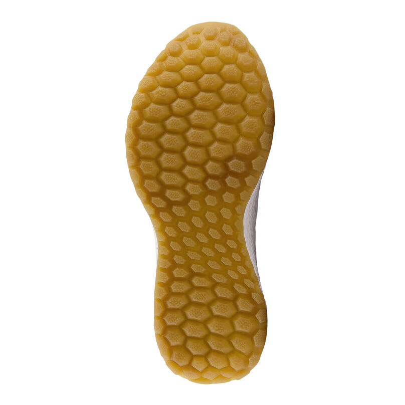 The bottom of the turf shoe tread.