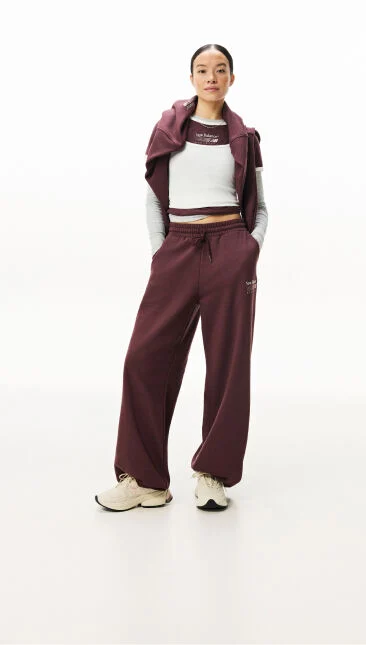 Woman standing with her hands in her pockets