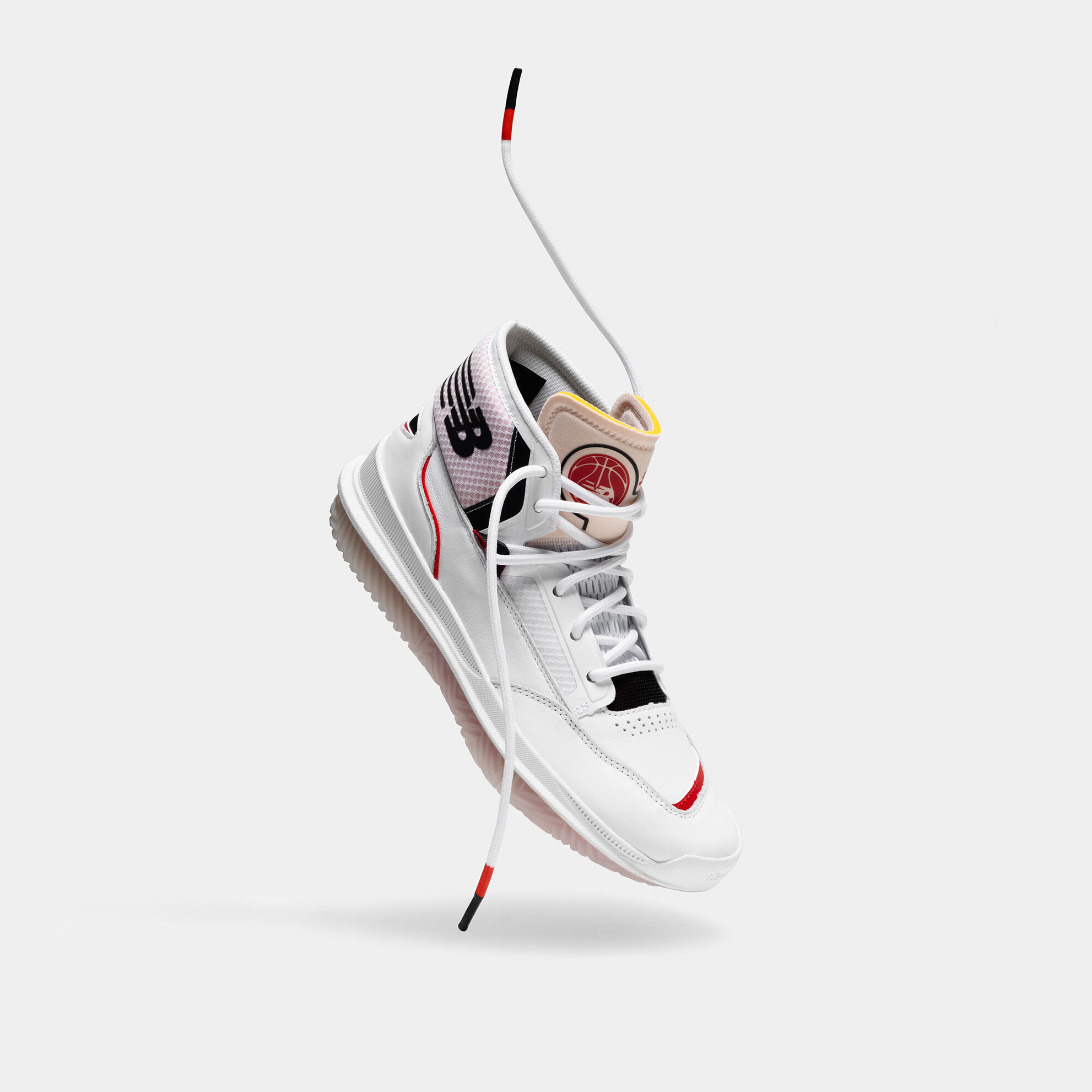 Shoe floating on gray background, laces stylized out