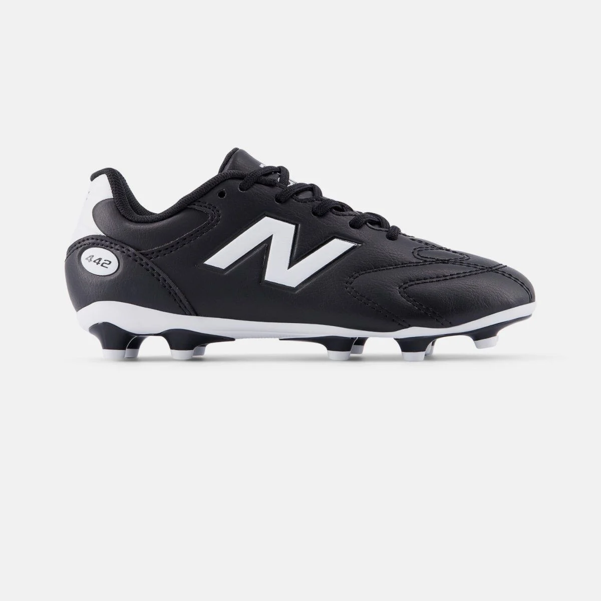 Side profile of a black New Balance soccer cleat on a white background, featuring a leather upper, white &ldquo;N&rdquo; logo, molded studs on the outsole, and a &ldquo;442&rdquo; mark near the heel. 