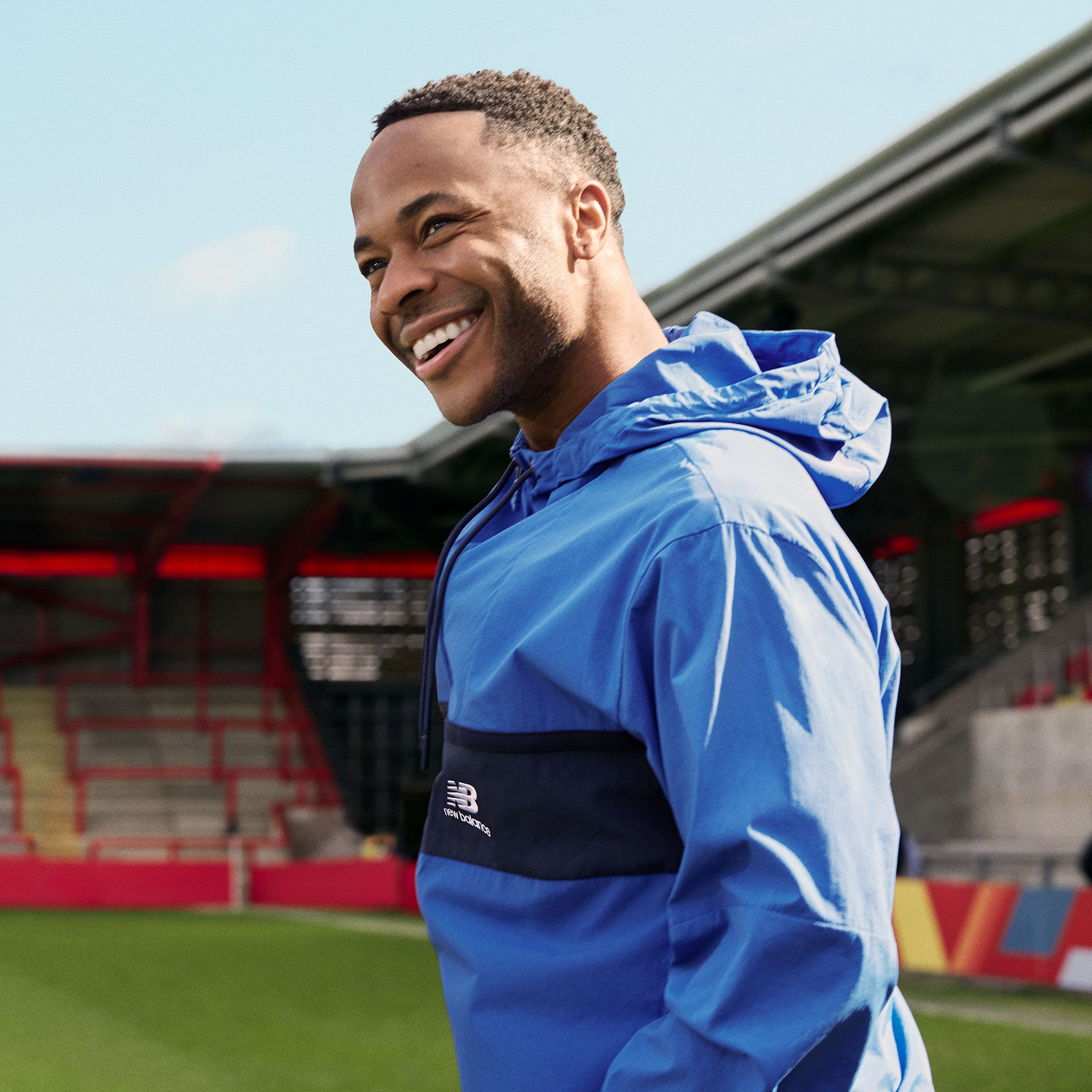 Raheem Sterling waist up shot smiling