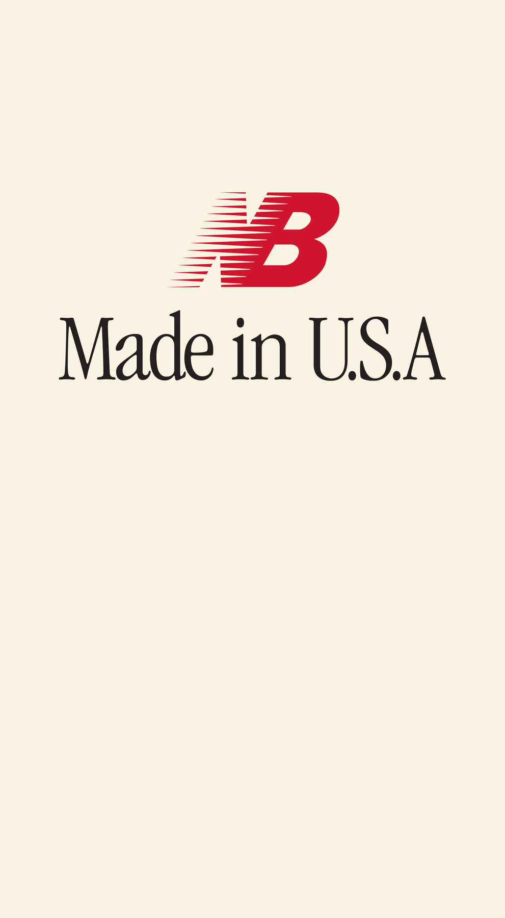 A red New Balance MADE in USA logo against a cream backdrop. 