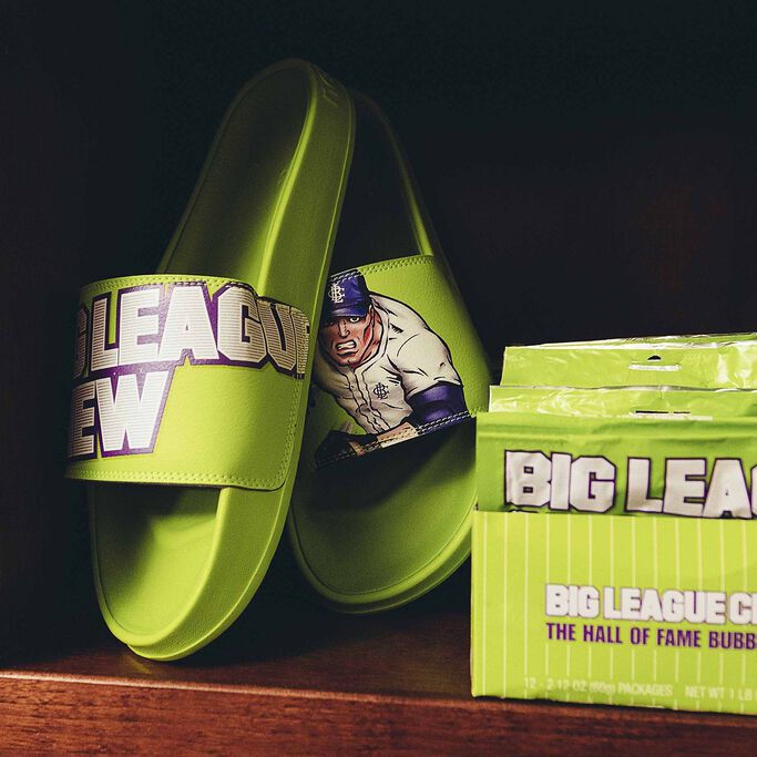 Green Big League Chew Sliders off figure with box of Big League Chew gum.