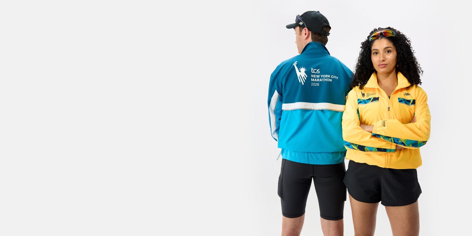 People wearing 2026 TCS New York City Marathon Collection apparel. 