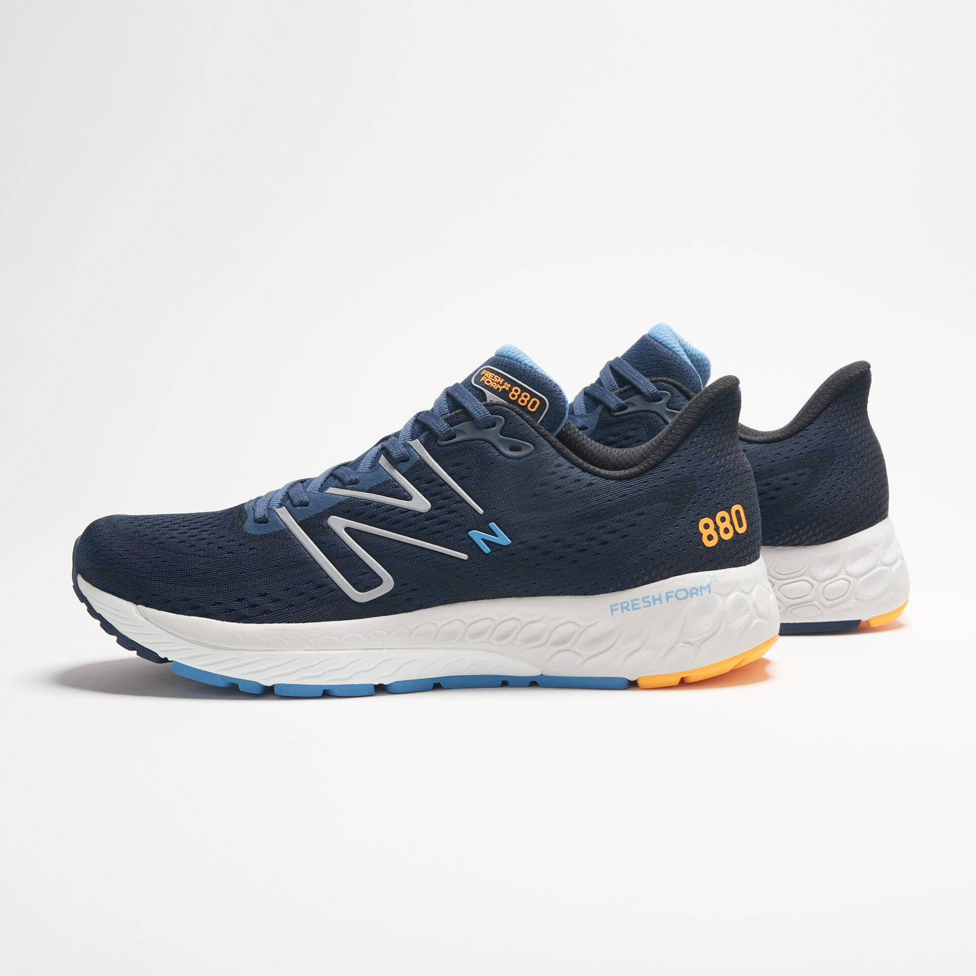 A studio shot of a pair of blue 880v13 shoes.