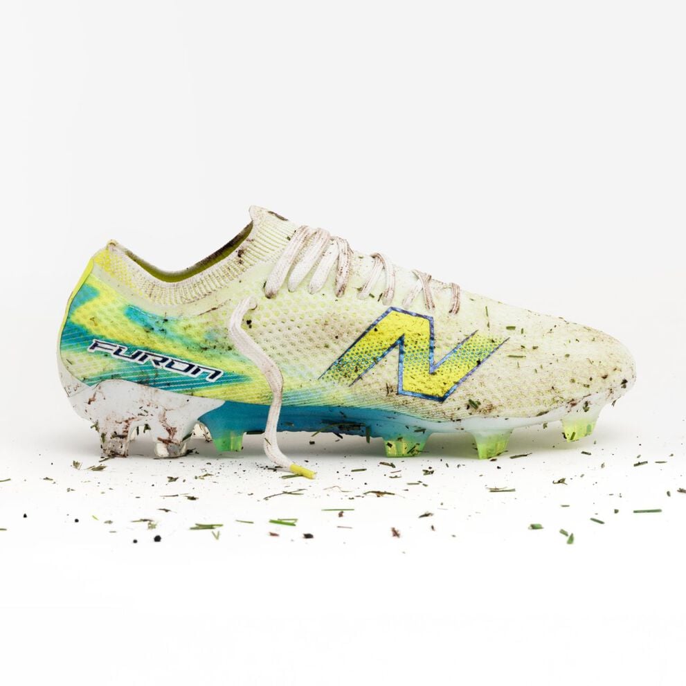 One muddy Furon boot on a white backdrop.