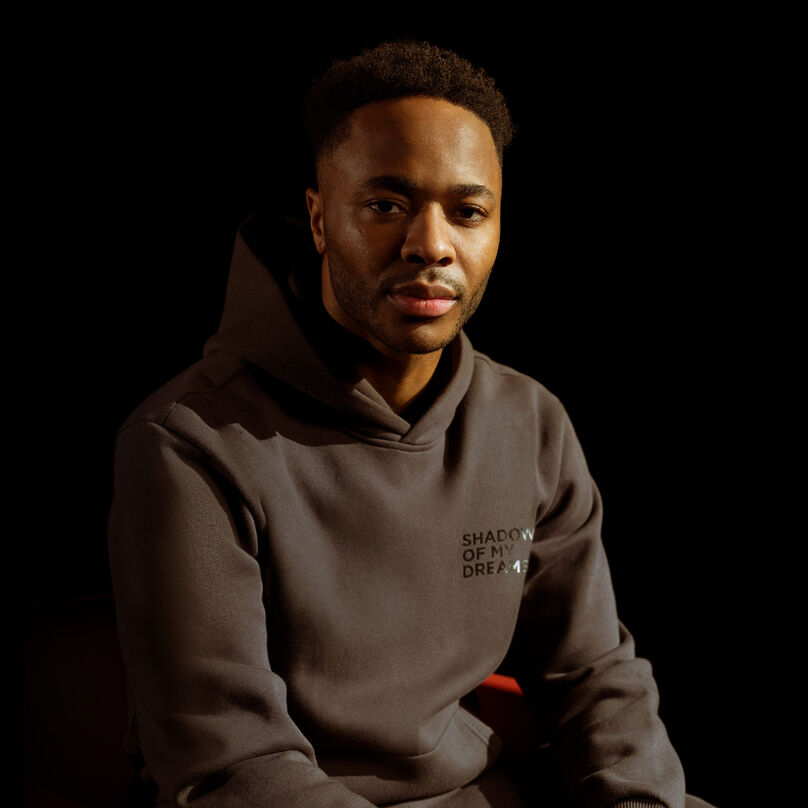 Raheem Sterling wearing Shadow of My Dreams hoodie