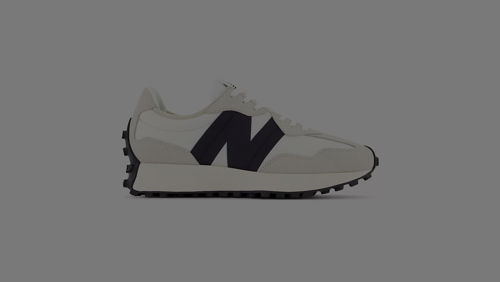 Off white and black New Balance 327.