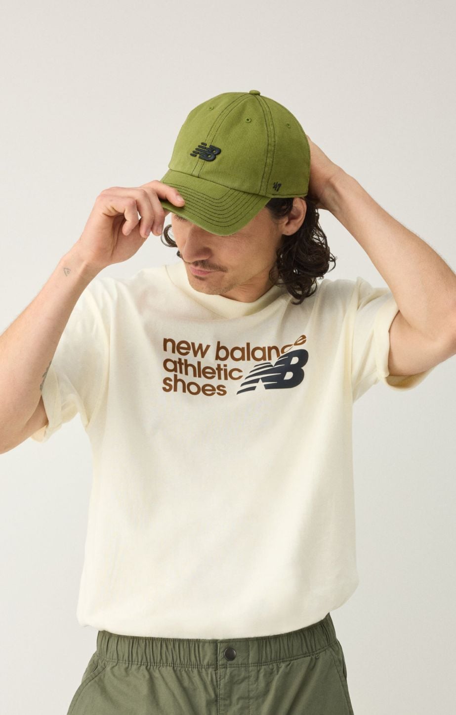 A man wearing a green hat. 
