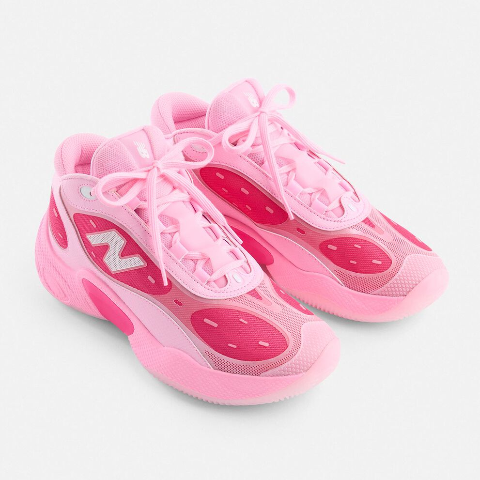 A pair of pink Fresh Foam BBV3 shoes on a grey studio background. 