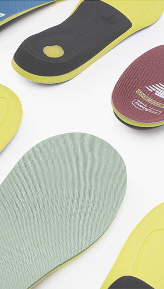 Insoles laid out on the floor.