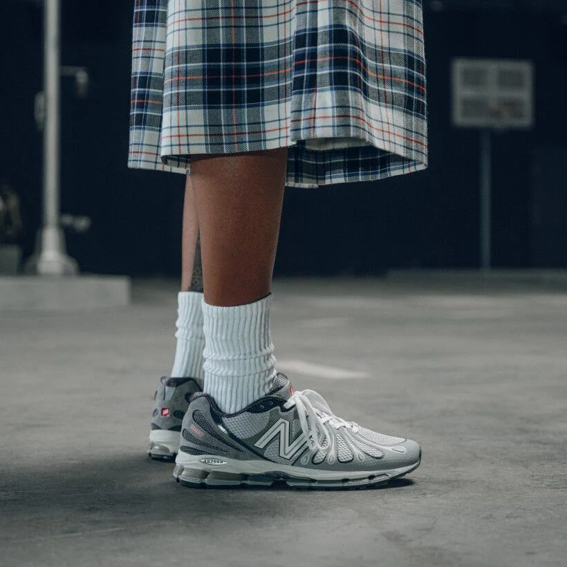 knee down image of person wearing grey 1890s