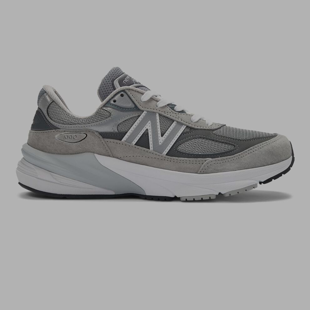 A grey 990v6 shoe.