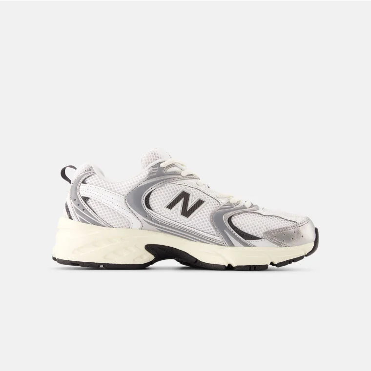 Silver metallic lifestyle shoes with cream and black outsoles.