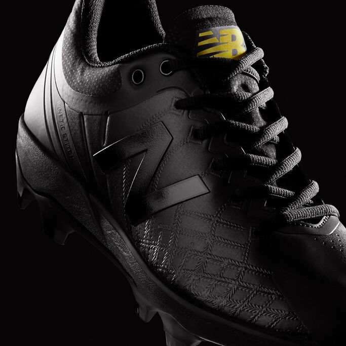 triple white new balance cleats