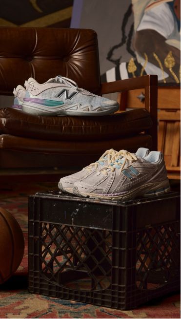 Hesi Low v2 and 1906R shoes in an artist studio environment.