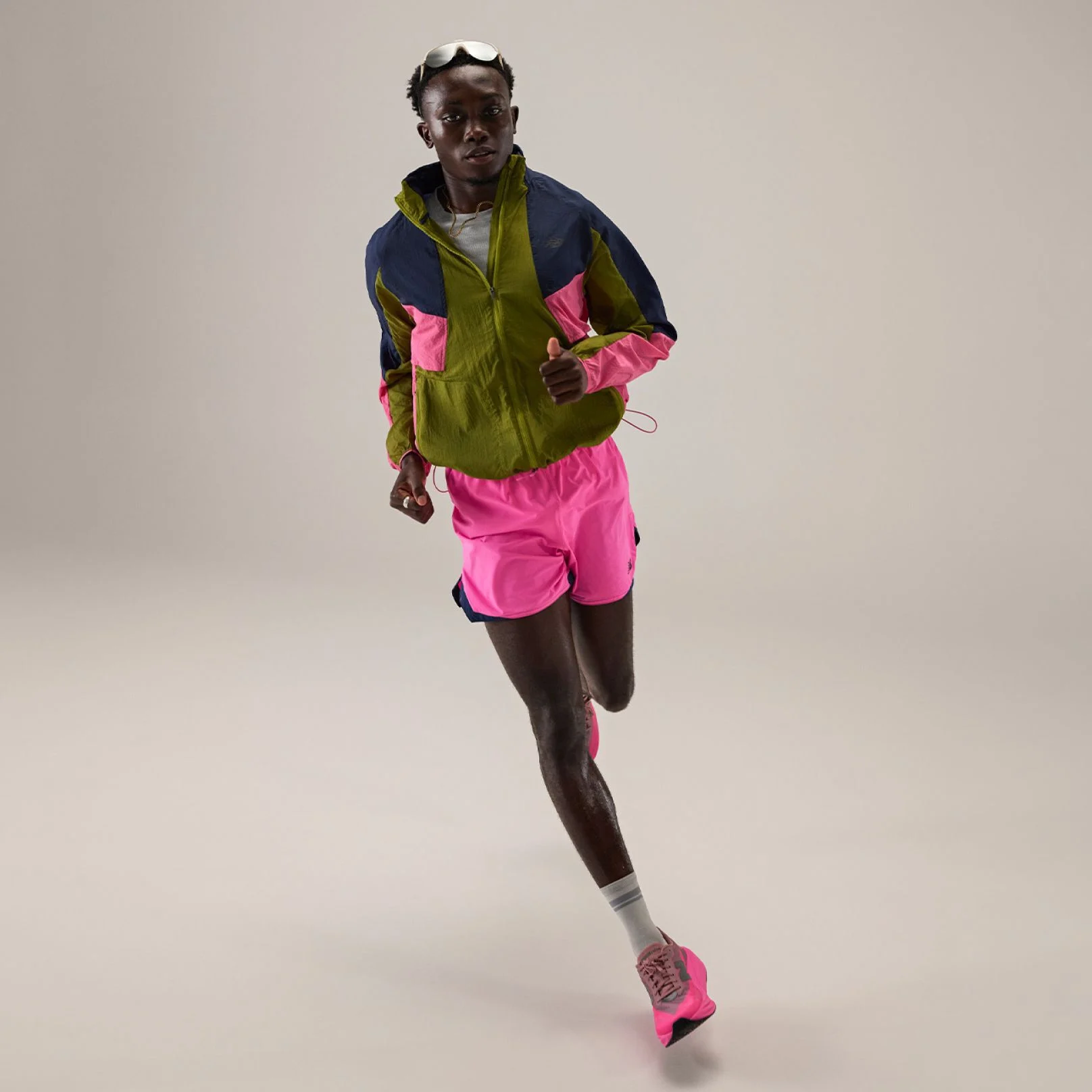 Tinoda Matsatsa running and wearing RC apparel. 