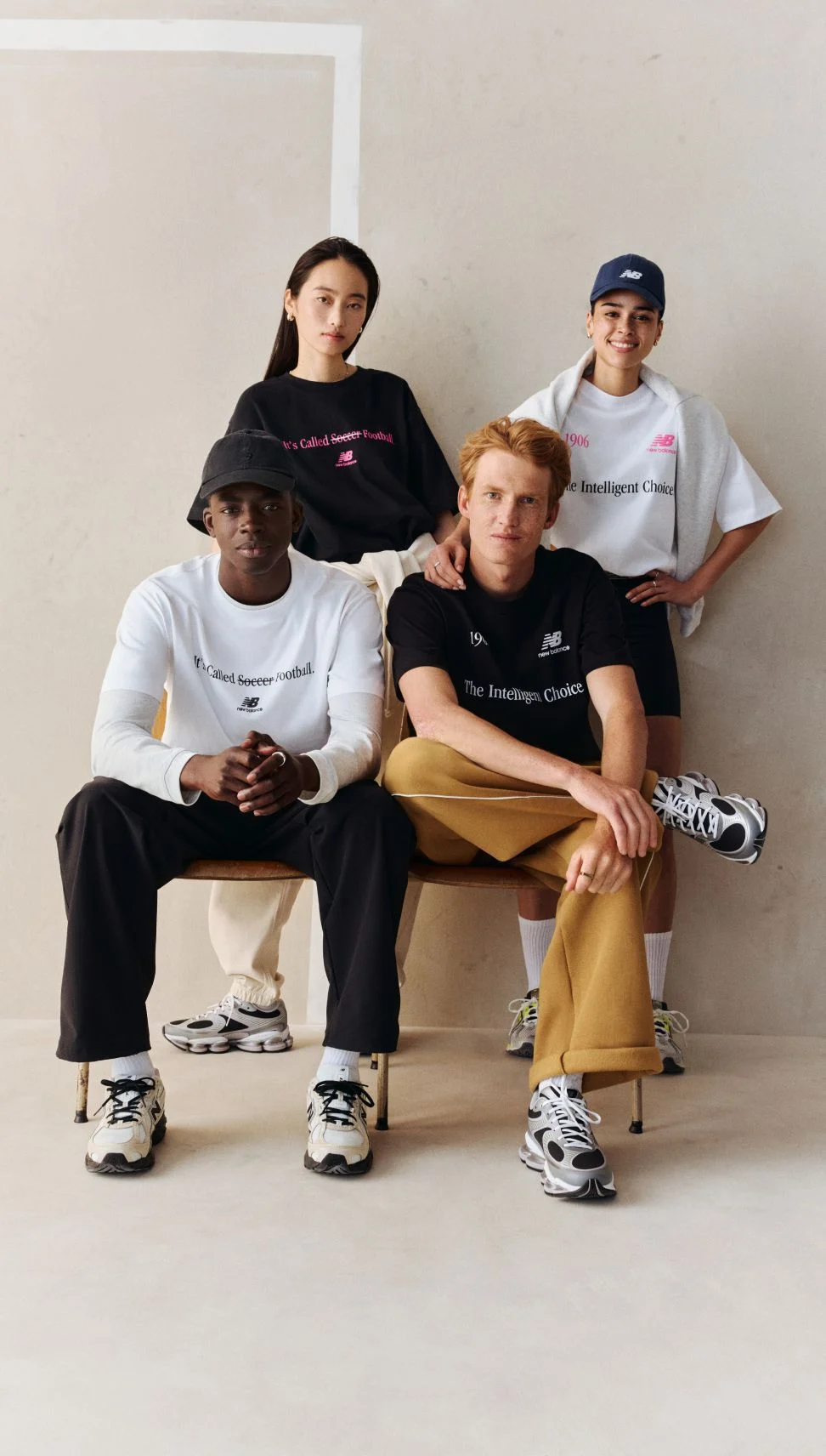 A group of people wearing soccer graphic t-shirts.