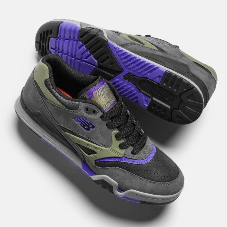 A pair of grey, green, and purple 770 shoes.